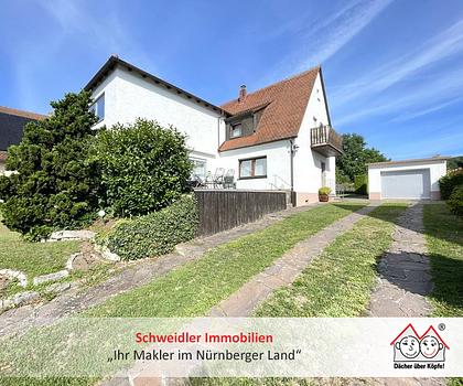Alleskönner in Heuchling! 2-Familienhaus mit schönem Grundstück & Garage in begehrter Lage von Lauf