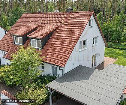Naturnah investieren – gut vermietete Doppelhaushälfte mit Garten und Doppel-Carport