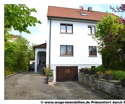 4-Zi-Whg mit EBK, Kachelofen, großer Terrasse, Garten und Garage
