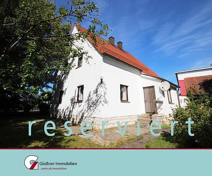 Schönes Grundstück mit renovierungsbedürftigem Wohnhaus