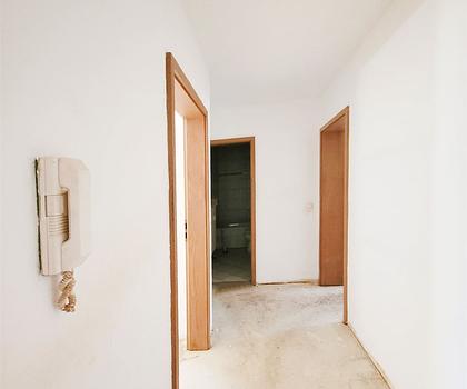 Zentral wohnen mit Balkon & Tiefgarage – 2-Zimmer-Wohnung mit Gestaltungsspielraum!