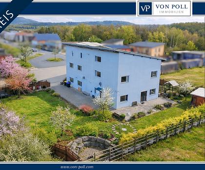 Duplex-Wohnung + Betriebsgebäude 
Terrasse + Garten, Blick in das Naturschutzgebiet