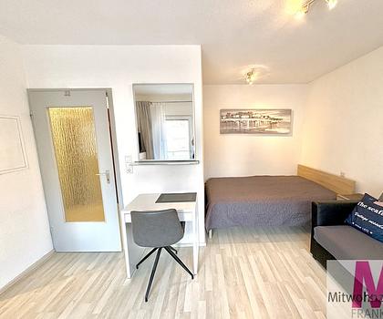 Charmante und lichtdurchflutete 1-Zimmer-Wohnung mit Balkon mit Blick in den ruhigen Hinterhof