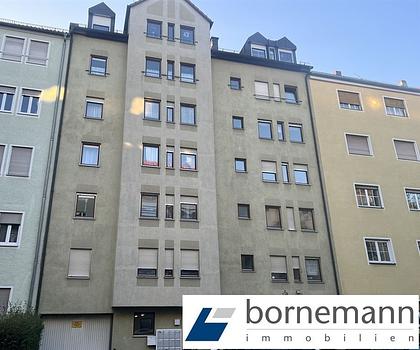 N-Süd, ruhige Seitenstraße! Ganz oben! Vermietete 4-Zi.-Galerie-ETW mit Westbalkon + TG!