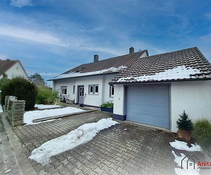 Familienfreundliches Wohnhaus mit flexiblem Raumkonzept in begehrter Lage