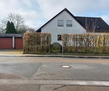 Doppeltes Wohnvergnügen: Einfamilienhaus mit Einliegerwohnung