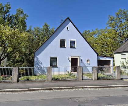 Wohnen am Wiesengrund – gepflegtes Familienhaus mit Wintergarten und Gartenidylle