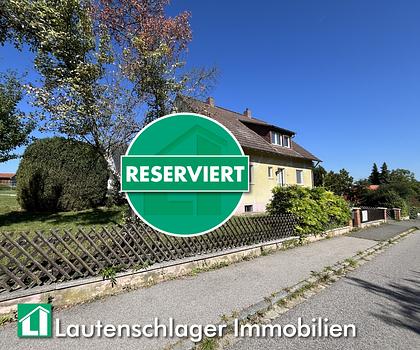 Sanierungsbedürftiges Ein- oder Zweifamilienhaus mit Doppelgarage in Unterferrieden